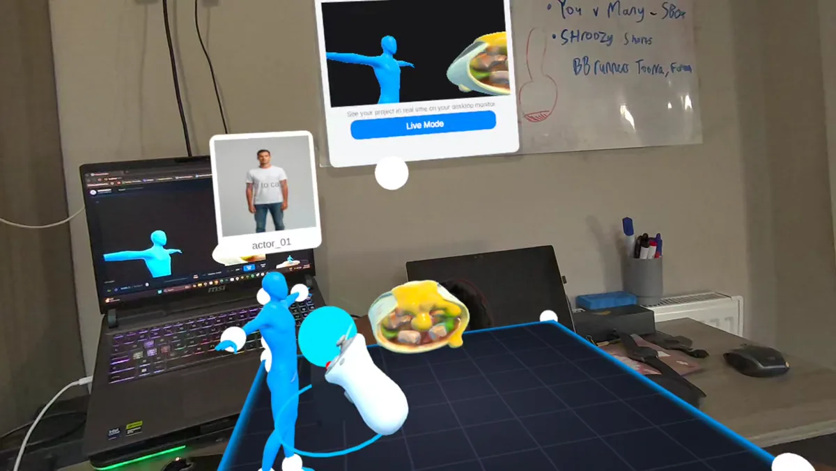 A Shroozy Stage mixed-reality scene with an actor, prop and desktop monitor